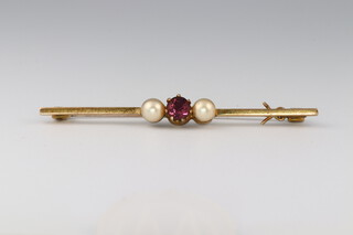 A 9ct gold bar brooch set amethyst and pearls 2.8g and a 9ct gold St Christopher medal 0.6g 