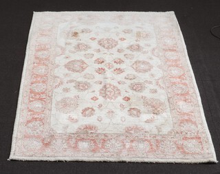 A white and red ground Ziegler floral patterned rug with all-over design 226cm x 145cm 