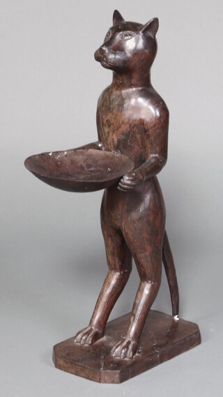 In the style of Giacometti, a 1970's pressed metal figure "The Cat Butler" 78cm h x 34cm w x 20cm d 