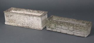 A well weathered rectangular concrete garden  plant trough 20cm h x 60cm w x 20cm d and 1 other 15cm h x 58cm w x 19cm d 