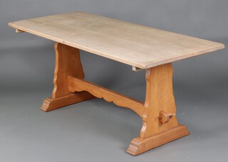 An elm refectory dining table on standard end supports 76cm h x 183cm l x 75cm w 