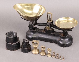 A pair of Libra domestic pan scales with weights