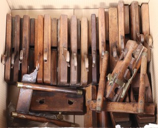 Fourteen various moulding planes, 2 smoothing planes and 2 wooden router planes  