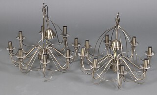 A pair of metal 9 light electroliers 43cm h x 56cm diam and 1 other 