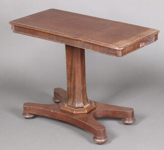 A William IV mahogany adjustable reading table, raised on a chamfered column with triform base and bun feet 70cm h x 90cm w x 44cm d (veneers loose and missing in places)
