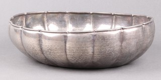 An oval planished white metal bowl 32cm 