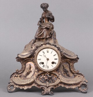 Samuel Marti of Paris, a French 8 day striking mantel clock with 8cm dial, Roman numerals, the back plate marked 35226, contained in a spelter case surmounted by a figure of lady gardener (not running, no pendulum or key) 