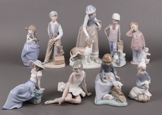 Eight various Nao figures together with a Lladro figure of Shepherd Boy with Lam 4676 boxed