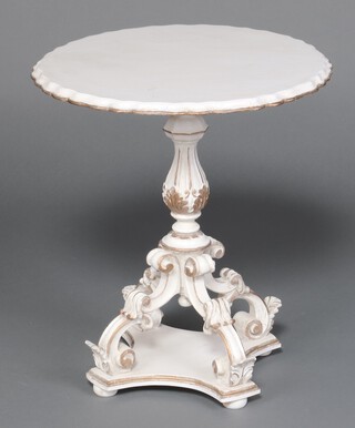 A Louis style white and gilt painted occasional table with pie crust edge, on turned column and scrolled supports 59cm h x 52cm diam. 