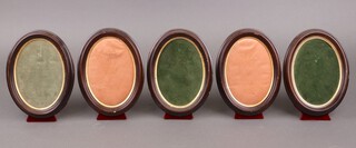 Five oval wooden and plush display frames 20cm x 15cm 