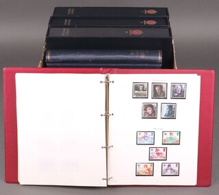 Volumes 1 and 2 (x2) of Stanley Gibbons GB mint stamps, a blue Concord album of GB stamps and a red  album of GB stamps 
