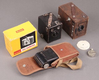 A Brownie Junior 6 x 20 camera, a folding camera etc 