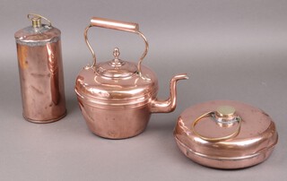 A circular copper foot warmer, copper kettle and a copper and brass hot water bottle
