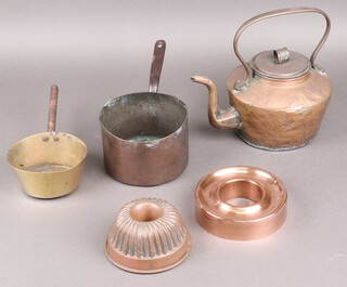 Benham & Co, a 19th Century copper saucepan with steel handle, a brass saucepan with steel handle, 2 copper jelly moulds and a copper kettle 