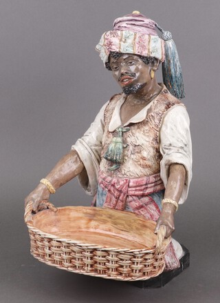 A 19th Century pottery figure of a liveried servant with basket 40cm (damaged) 