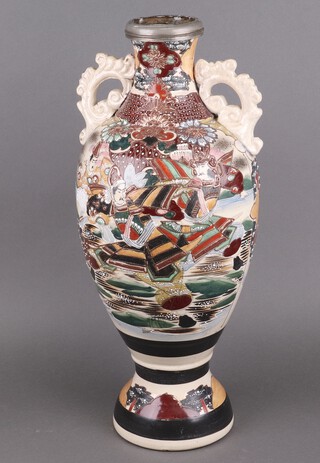 A Japanese Satsuma pottery twin handled vase decorated a figure 59cm (cracks in places) 
