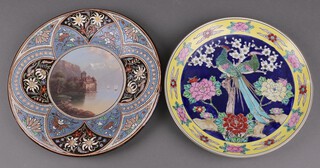 A Swiss Thoune Majolica charger decorated mountain and lake scene 30cm, together with a Japanese porcelain plate decorated birds 8cm 