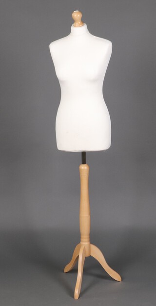 A tailors mannequin on a turned beech stand 