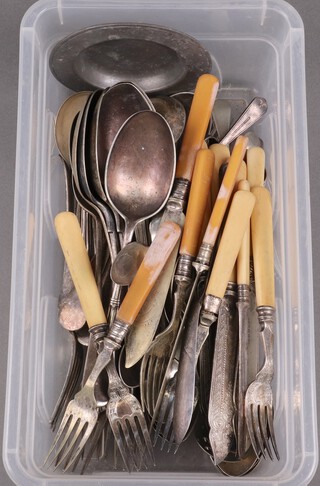 A circular pewter dish 11cm and a small collection of silver plated flatware 
