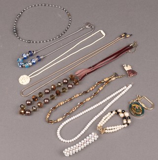 A collection of costume jewellery including beads etc