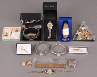A gentleman's Accurist wristwatch boxed, a Lorus quartz wristwatch boxed, a lady's Sekonda wristwatch boxed and other fashion washes and cufflinks contained in a wooden box 
