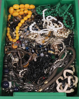 A quantity of costume jewellery including necklaces, beads, etc 