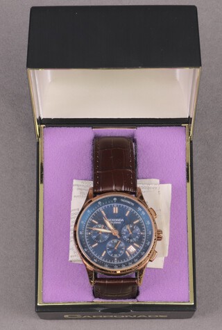 A Seiko chronograph wristwatch in a gilt metal case with multiple dials