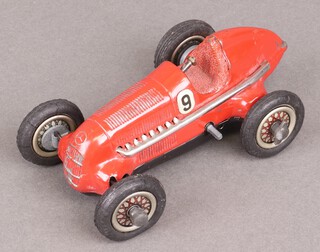 A Schuco Studio clockwork racing car (no key or steering wheel, back wheel loose) 