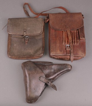 A Second World War German leather Luger holster and 2 leather map cases 