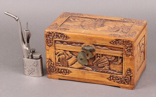 A Chinese water pipe together with a rectangular carved coffer trinket box with hinged lid  