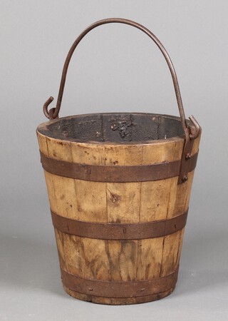 An Eastern coopered hardwood bucket with swing handle 30cm h x 30cm diam.