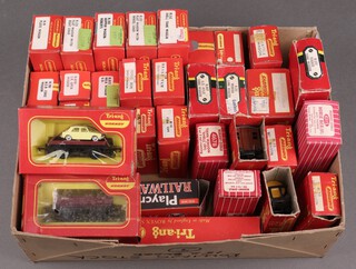 A collection of Triang and Hornby OO gauge rolling stock, all boxed 