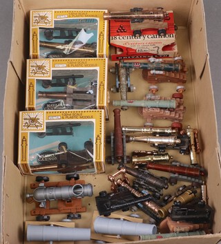 Three Britains Naval cannons boxed, a Britains 18th Century cannon boxed together with a collection of other canons 