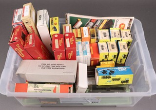 A collection of Triang, Hornby, Piko OO gauge rolling stock, all boxed and contained in a clear plastic box 