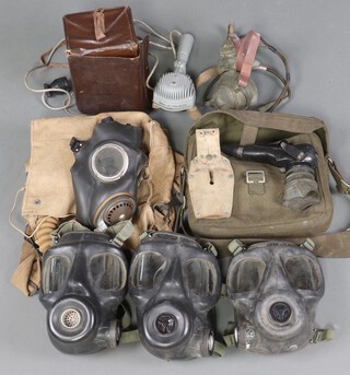 A Tannoy YA4353 Second World War naval hand held microphone, 1 other, a service respirator, etc 
