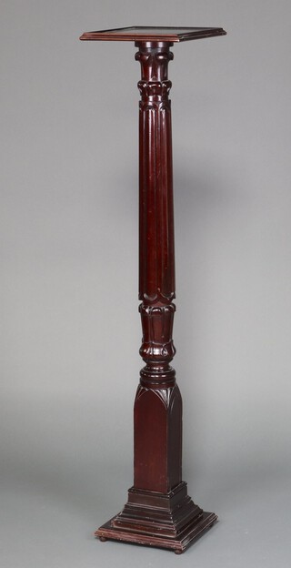 A reproduction William IV mahogany bedpost torchere/plant stand on a square stepped base 151cm h 