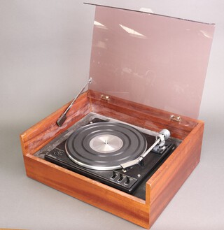 A Garrard Transcription Model AP76 record player turntable with perspex lid and fitted wooden case 