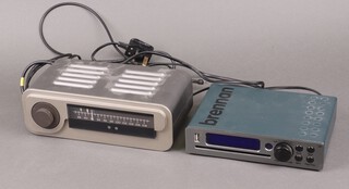 An unbranded FM radio receiver together with a Brennan CD ripper 
