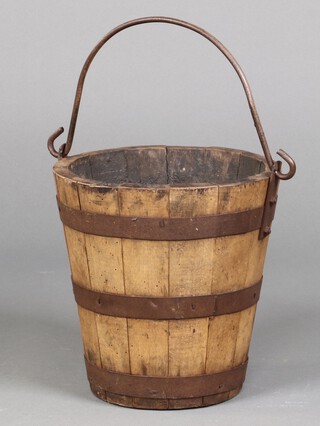 An Eastern coopered hardwood bucket with swing handle 30cm h x 30cm diam. 