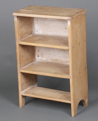 A pine bookcase fitted 3 shelves 80cm h x 49cm w x 29cm (small section of timber missing to the back right side) 