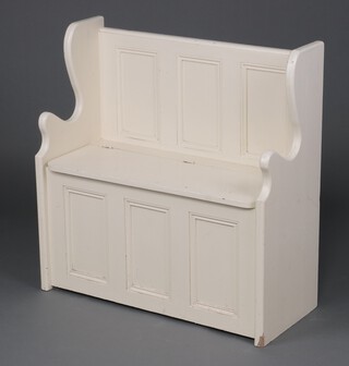 A white painted settle with hinged lid  91cm h x 89cm w x 48cm d 