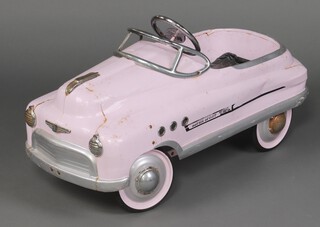 A Super Toys pink painted pressed metal pedal car 40cm h x 98cm l x 40cm d 