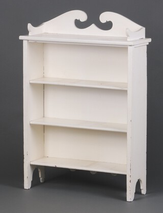 A white painted 3 tier bookcase with 3/4 gallery to the back 90cm h x 57cm w x 21cm d 