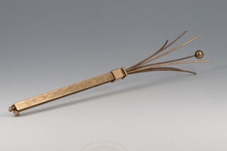 A 9ct gold cocktail swizzle stick, 6.5g gross 