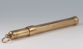 S Mordan & Co, a gold cased propelling pencil with ribbed decoration, complete with pencil, 12g gross