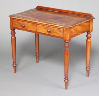 A Victorian mahogany side table with raised back, fitted 2 drawers, raised on turned supports 78cm h x 89cm w x 52cm d 