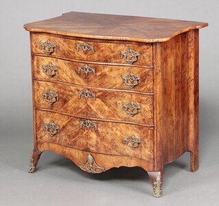 An 18th century Italian yew commode of serpentine outline, fitted 4 long drawers, raised on bracket feet 83cm h x 89cm w x 56 cm d 