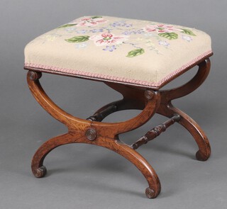 A Victorian rectangular mahogany stool, with Berlin wool work seat, raised on X framed supports with turned stretcher 41cm h x 45cm w x 37cm d 