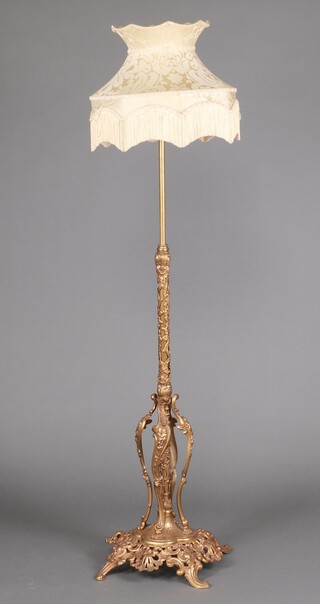 A 19th century pierced and gilt painted metal adjustable standard lamp, raised on a pierced floral style foot 100cm h x 48cm diam. 