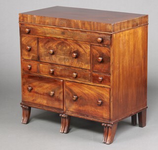 A Georgian Scottish mahogany enclosed wig/wash stand with hinged lid, the interior fitted a mirror to the centre flanked by 2 lidded compartments, the base fitted an arrangement of 2 long and 3 short drawers with commode drawer, raised on scroll supports 92cm h x 91cm w x 50cm d  